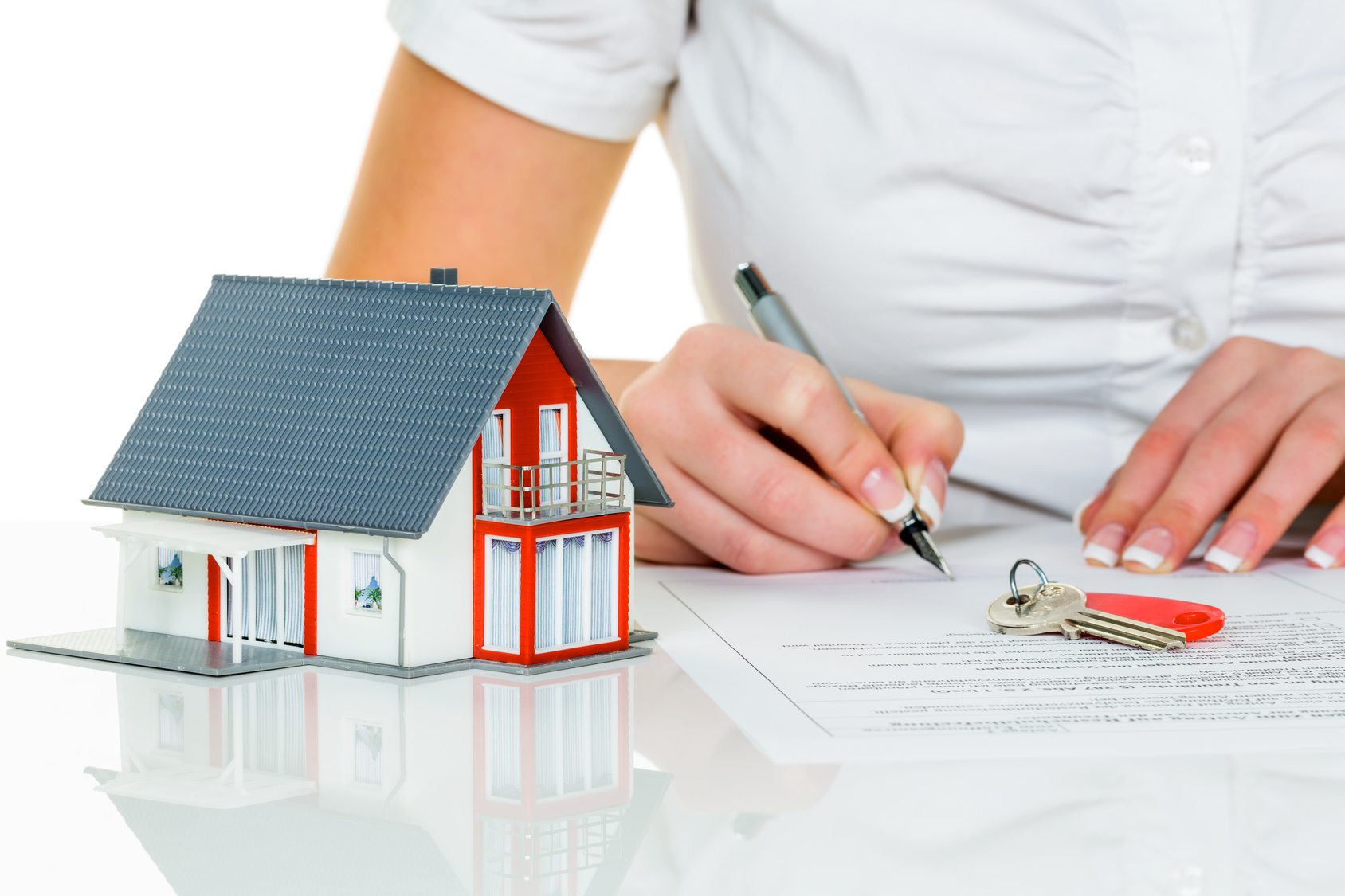 woman-signing-contract-for-home-purchase